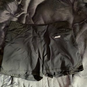 These are black, worn once, spandex bike like athletic shorts